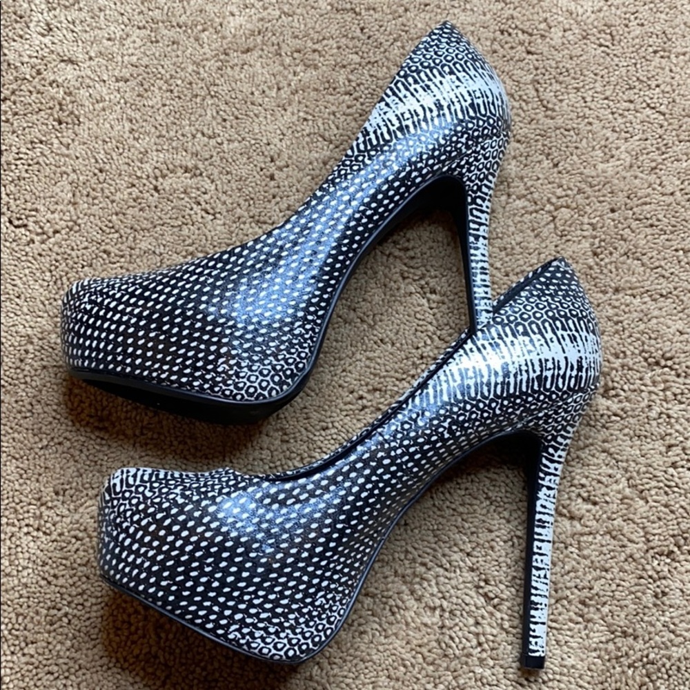 Black and white spike heels.